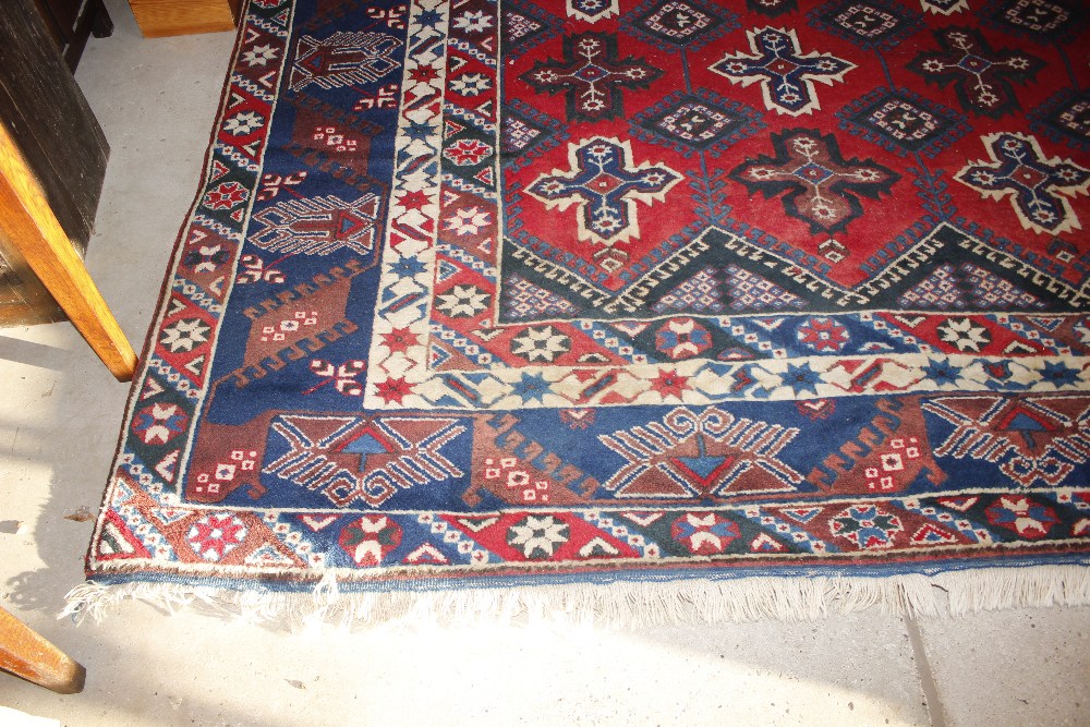 A Dosnealti carpet, South West Turkey, the red field with overall column of hooked and stepped - Image 11 of 15