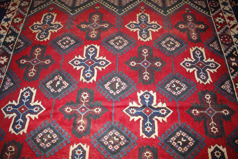 A Dosnealti carpet, South West Turkey, the red field with overall column of hooked and stepped