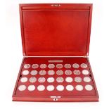 Queen Elizabeth II Royal Silver Crown collection, (32 coins in fitted wooden display case)