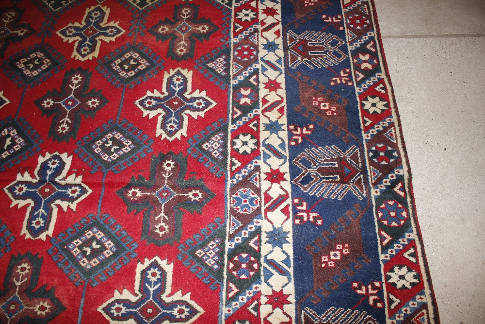 A Dosnealti carpet, South West Turkey, the red field with overall column of hooked and stepped - Image 6 of 15