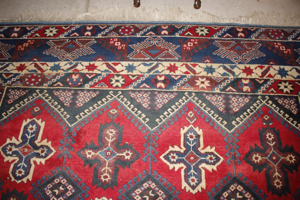 A Dosnealti carpet, South West Turkey, the red field with overall column of hooked and stepped - Image 8 of 15