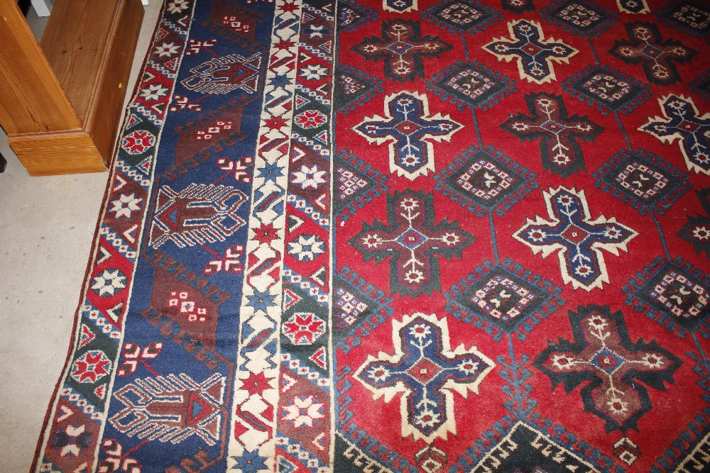 A Dosnealti carpet, South West Turkey, the red field with overall column of hooked and stepped - Image 12 of 15