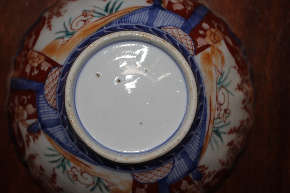 A 19th Century Chinese Imari scallop bordered bowl, decorated in the traditional palette, 14cm dia. - Image 2 of 2