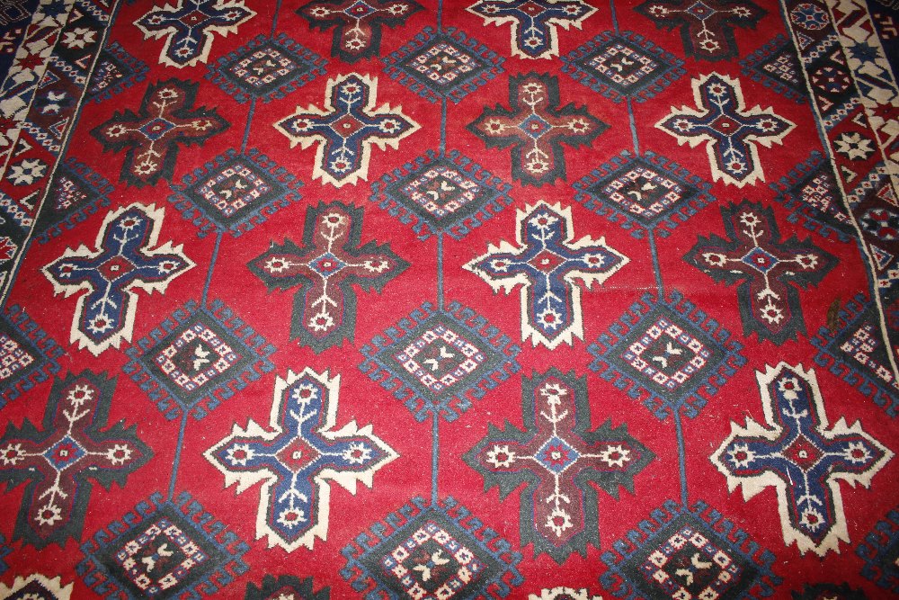 A Dosnealti carpet, South West Turkey, the red field with overall column of hooked and stepped - Image 9 of 15