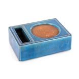 A Chinese porcelain blue ground rectangular shaped mixing block for ink, six character mark to