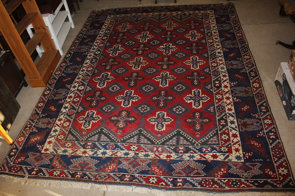 A Dosnealti carpet, South West Turkey, the red field with overall column of hooked and stepped - Image 3 of 15