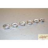 Six Iraq silver and Niello napkin rings