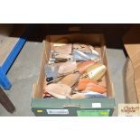 A box of various shoe stretchers