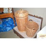 A wicker Alibaba basket and one other twin handled