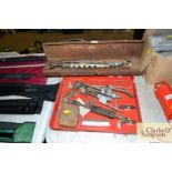 Two cases of acetylene torches and nozzles