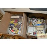 A collection of vintage match boxes and match box