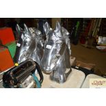 A polished aluminium horse head