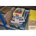 A box containing various games and puzzles