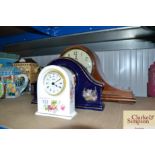 A Howard Miller three hole mantel clock together w