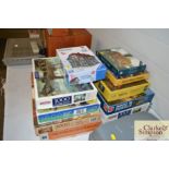 A quantity of various jigsaw puzzles