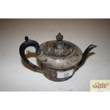 A silver bachelors teapot