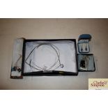 A quantity of silver and topaz jewellery etc.