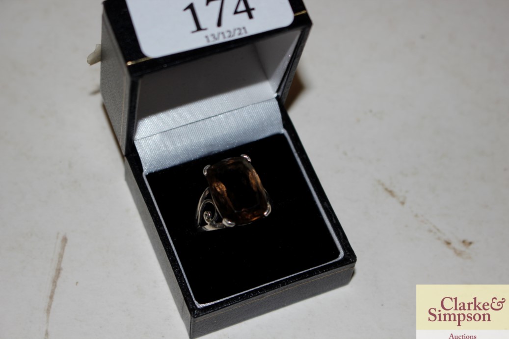 A boxed 925 smoky quartz set dress ring