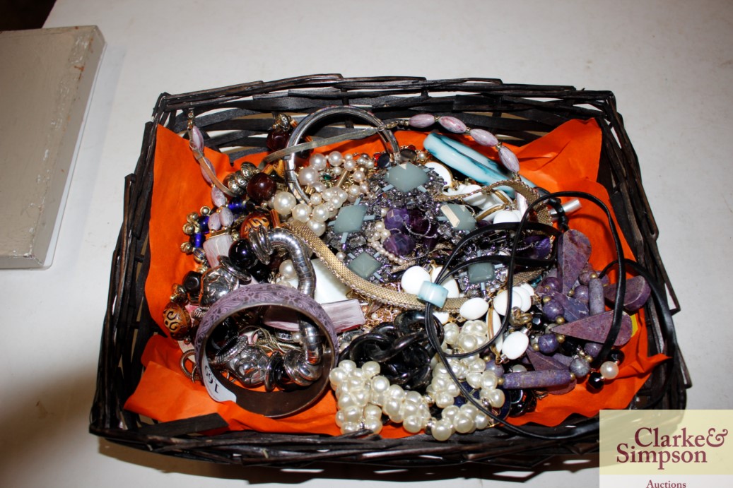 A basket of miscellaneous costume jewellery
