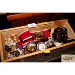 A box of miscellaneous commemorative coins, badges