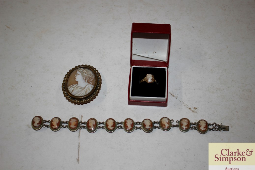 A cameo brooch; a boxed cameo ring; and a bracelet