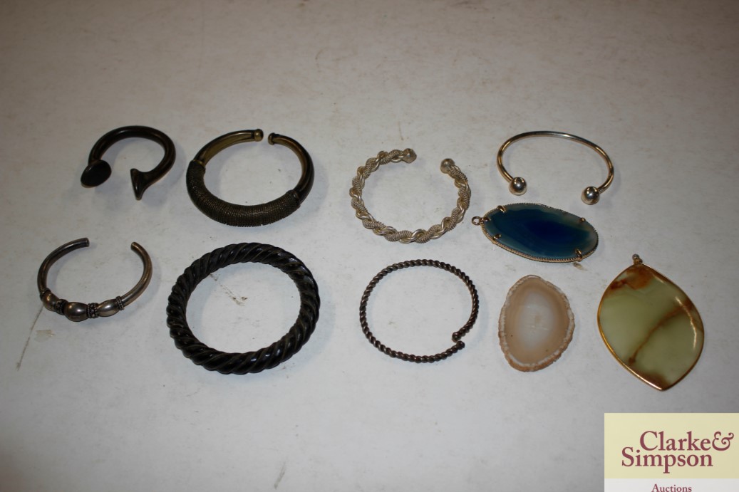 Various white metal and other bangles, hard stone