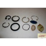 Various white metal and other bangles, hard stone