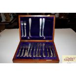 A part set of silver bladed fish knives and forks,