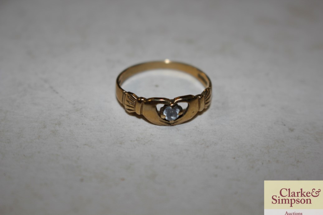 A 9ct gold and white stone set ring