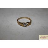 A 9ct gold and white stone set ring