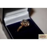 An 18ct gold and diamond set ring