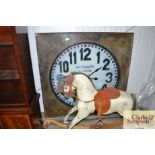 A large metal French industrial style clock