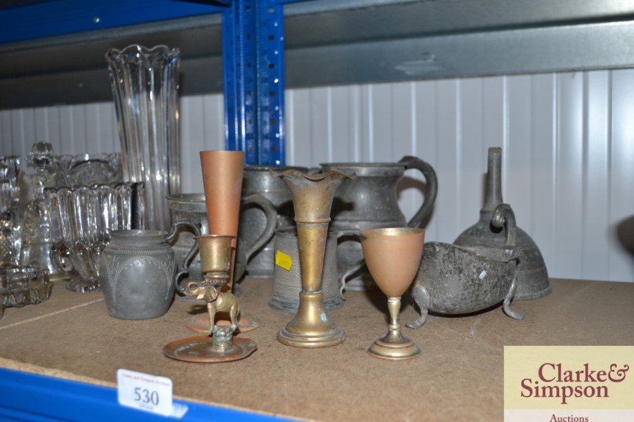 A quantity of pewter tankards, pewter sauce boat,