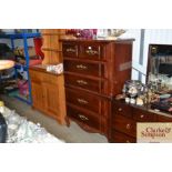 A reproduction mahogany chest, fitted two short ov