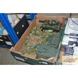 A box containing toy tanks and soldiers