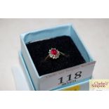 A ruby and diamond 9ct gold ring