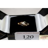 A diamond and sapphire 18ct gold ring