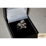 A 925 white stone set cluster dress ring