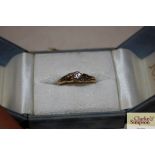 A diamond solitaire 18ct gold ring