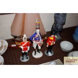 A Royal Doulton figure of a guardsman, another of