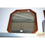 A bevel edged octagonal wall mirror