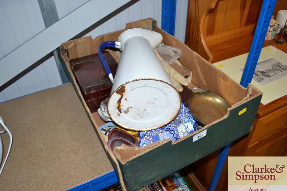 A box containing a large enamel jug; various glass