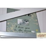 A decorative "Love" photo frame