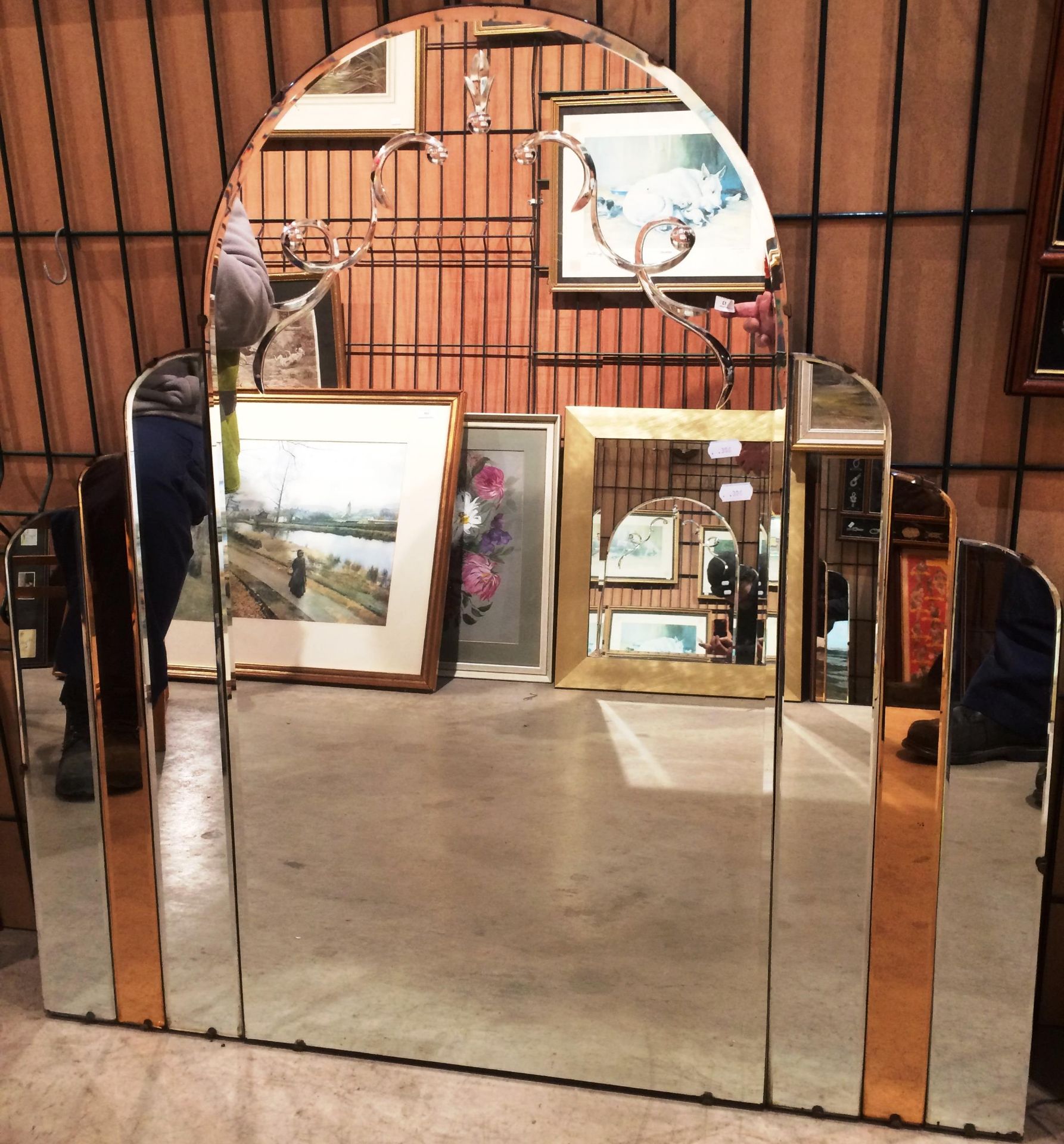 An arch top Art Deco style wall mirror 92cm max x 91cm max