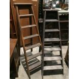 Two six-step wooden step ladders