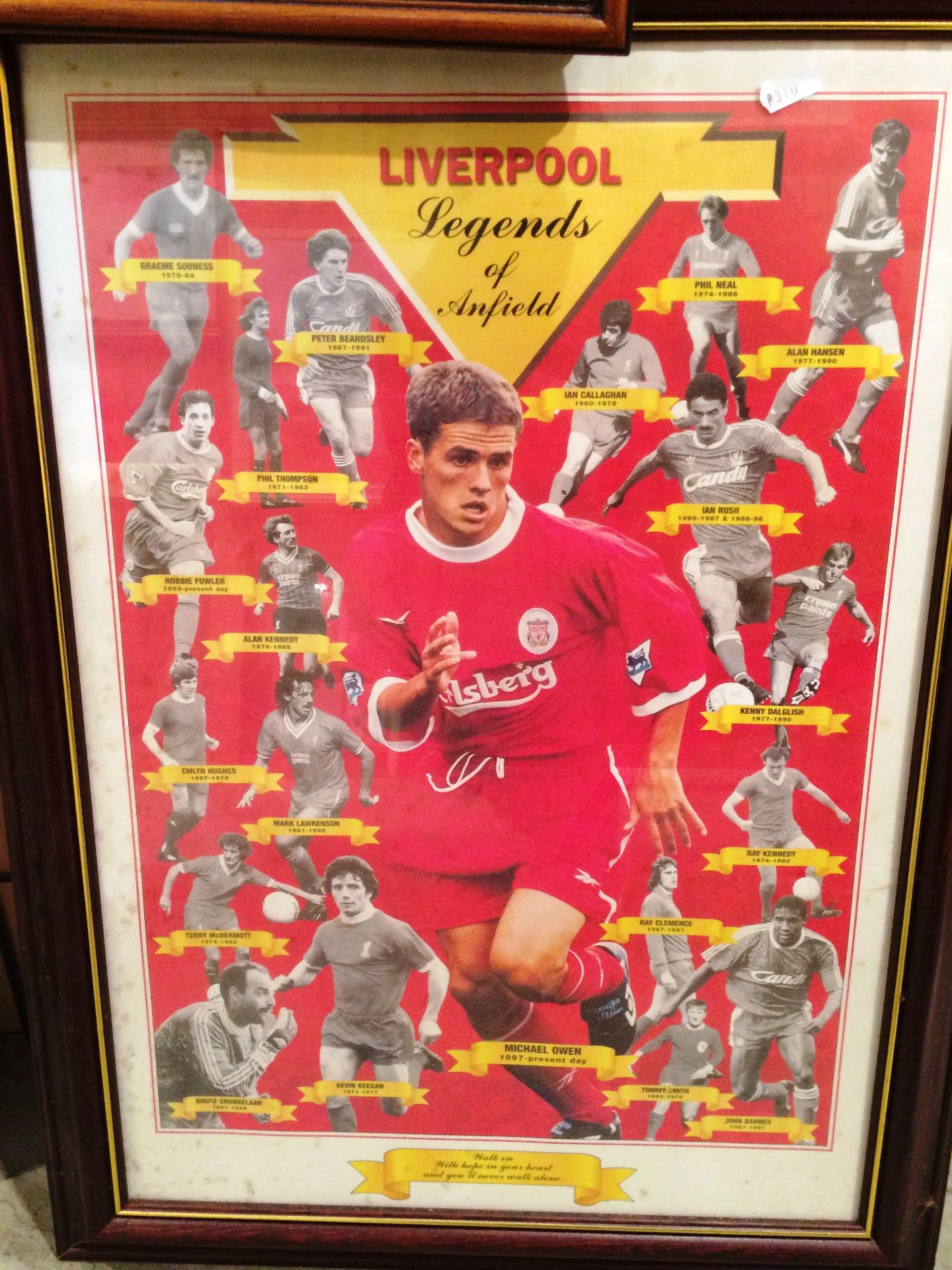 A framed sporting print 'Liverpool - Legends of Anfield' 58 x 40cm