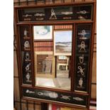 Framed wall mirror flanked by a display of various knots 60 x 45cm crack to glass bottom right