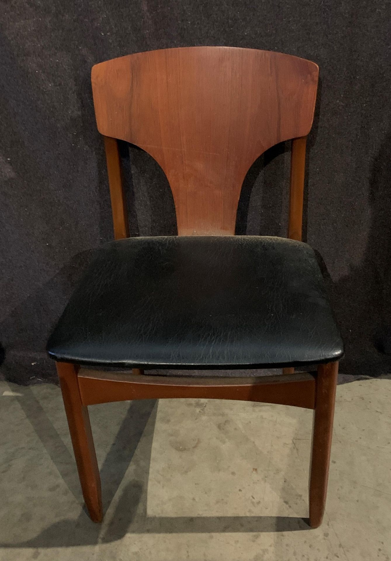 Three teak 1960s dining chairs with black PVC seats - [Please note - the upholstery in this lot - Image 3 of 4