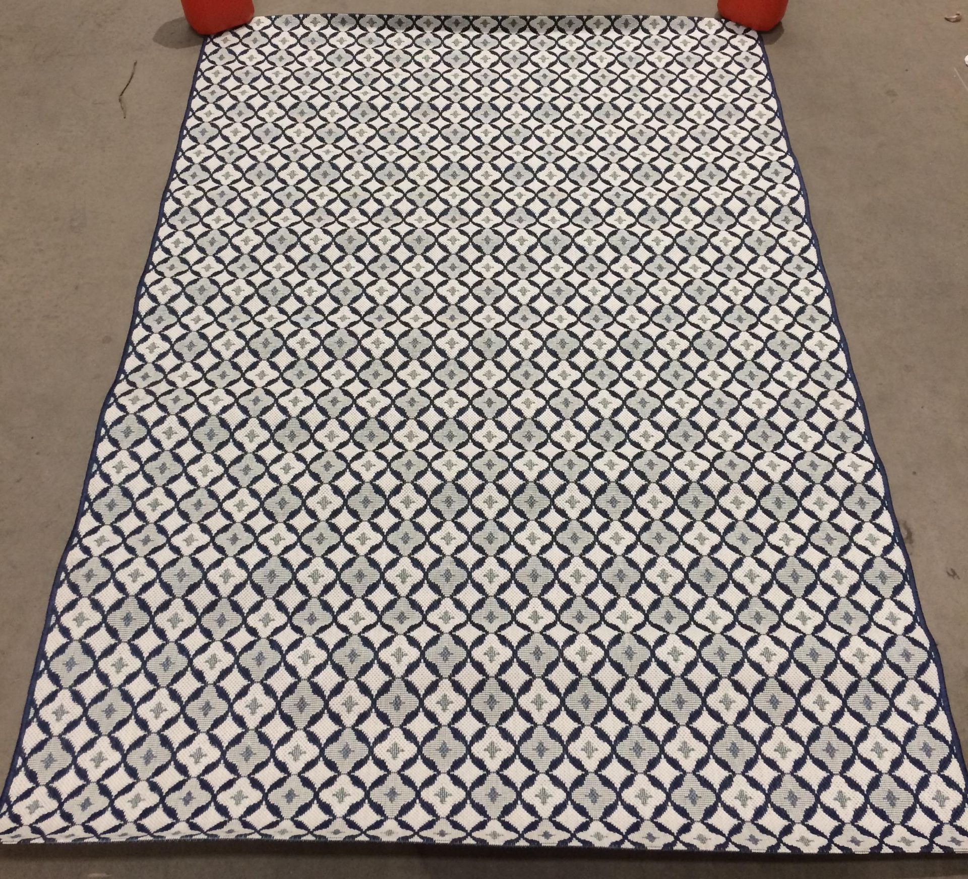 White and blue patterned rug,