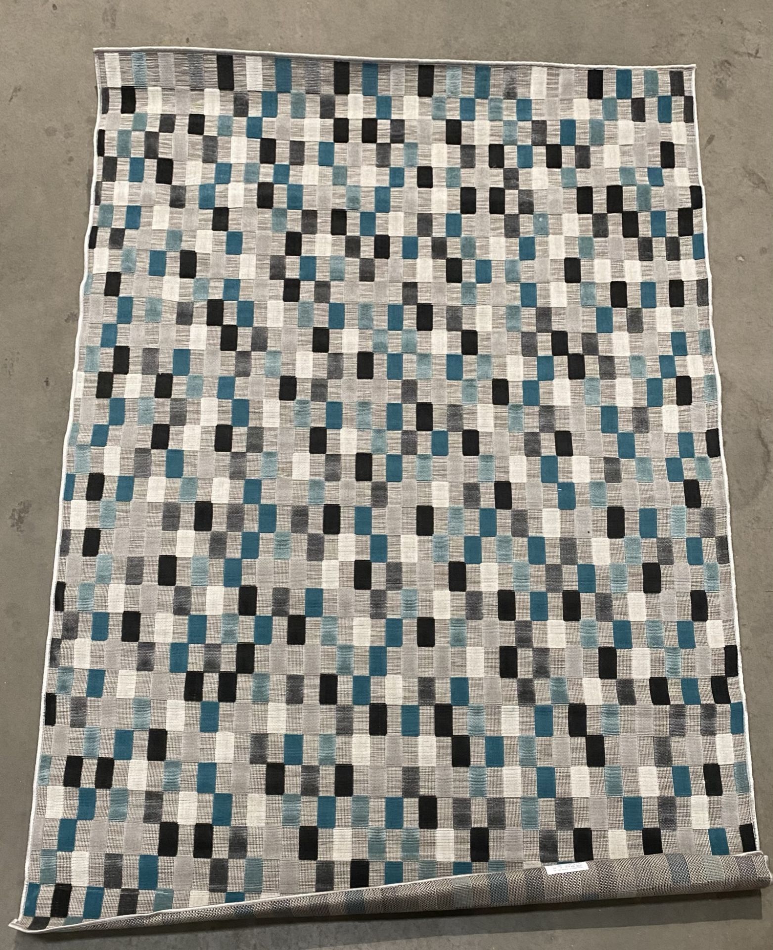 Grey, blue and green checked pattern rug,